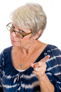 mature woman wagging her finger